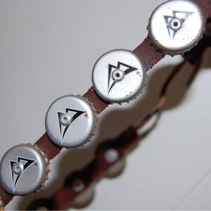 Bottle cap hat band for western hats